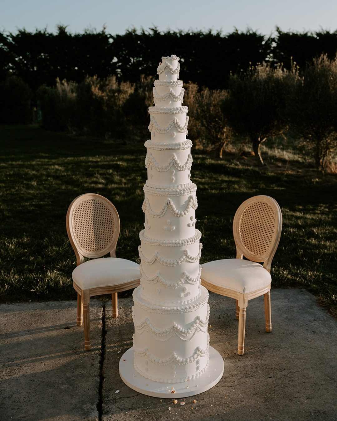 The taller the cake, the sweeter the moment. 🍰
@fulltimetart absolutely nailed this showstopper.

Captured For: @myweddingmag 
Venue: @theflaxmill 
Photographer: @jesshowzen.photography 
Styling/Hire: @blank_spaceevents 
Dresses & Veils: @sarahstoutebespoke 
Menswear: @workingstylenz 
Florals: @alittlebit.floral 
Cake: @fulltimetart 
Hair& Makeup: @makeupstationteam 
Hire: @littlehirecomp 
Cocktails: @thecocktailpeople 
Stationary: @paperweight_design 
Lace Welcome Sign: @hstudio.co 
Signage Stand: @loulahire 
Models: @nicolej.performer ellis_jhr
